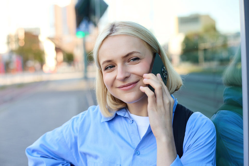 blond woman talking on the phone blond woman talking on the phone