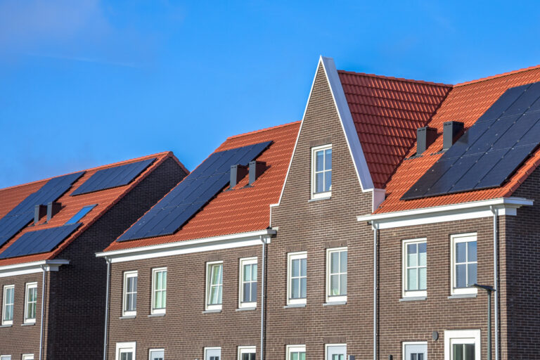 Close up of Modern row houses with  solar panels