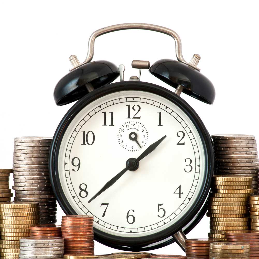 time is money concept alarm clock lots euro coins